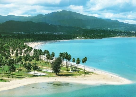 Natural river slide + Beach and El Portal Del Yunque.