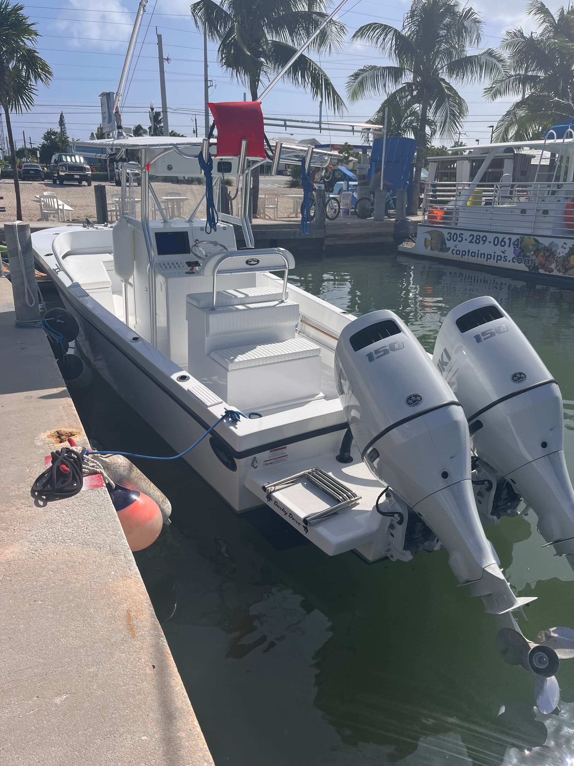28' Dusky Twin Engine Suzuki 150HP - Ghost Rider 2024