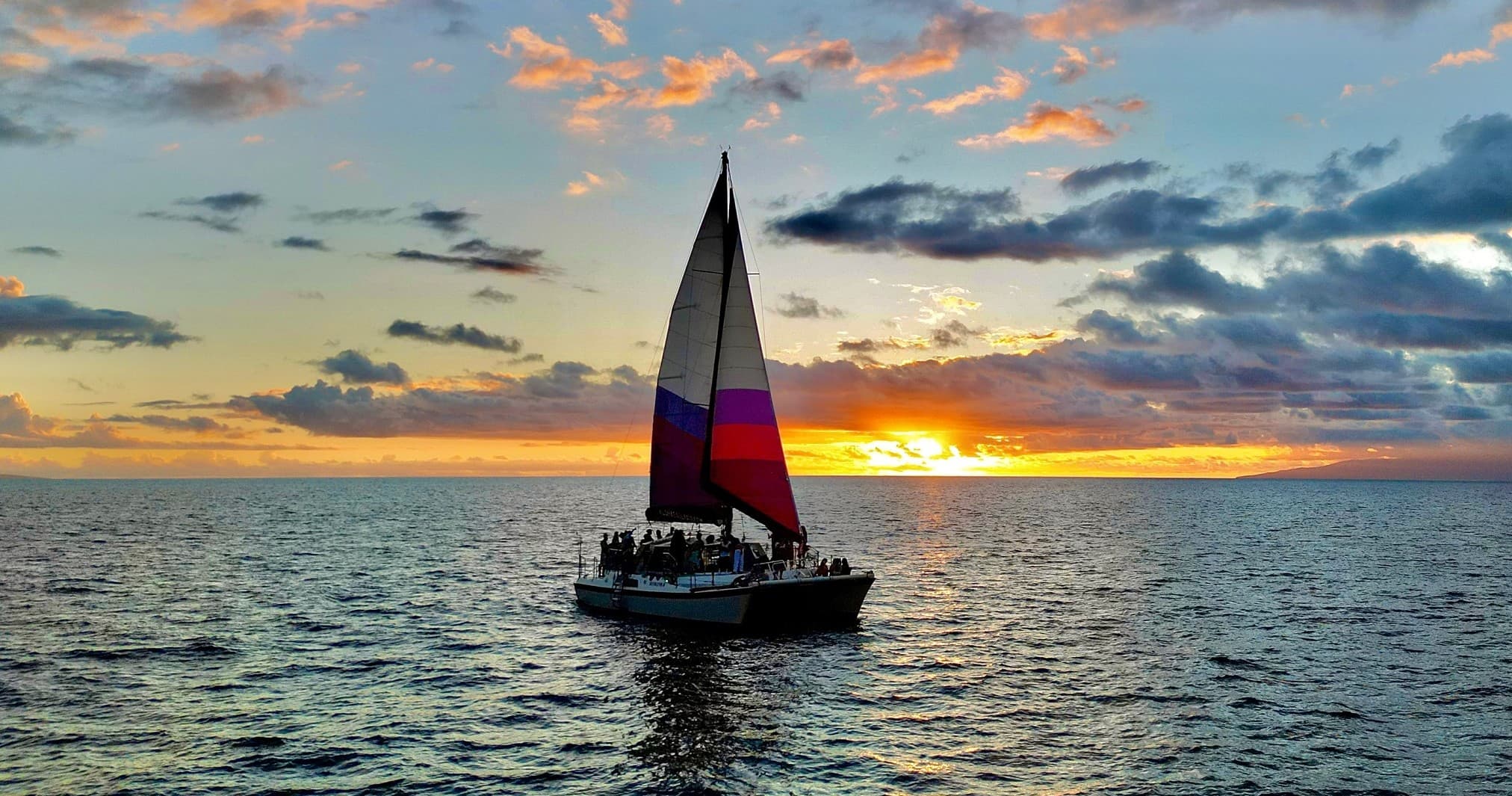 Sunset Sailing on a Floating Tiki Bar Charming Hawaiian Catamaran