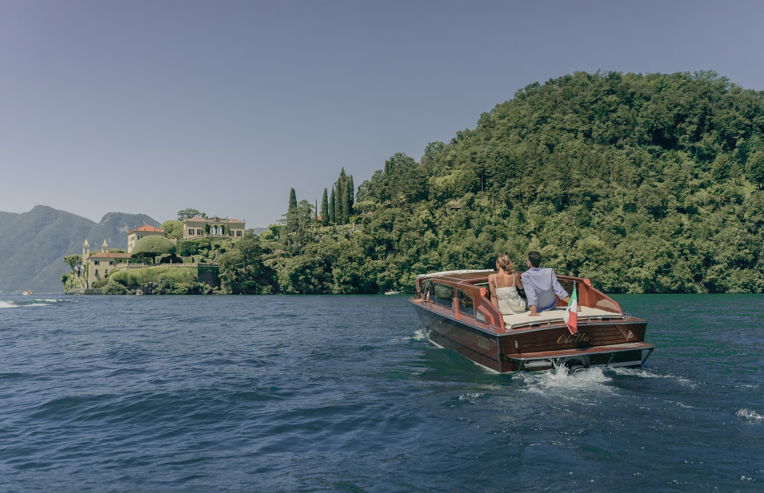Classic wooden boat tour on Lake Como with captain