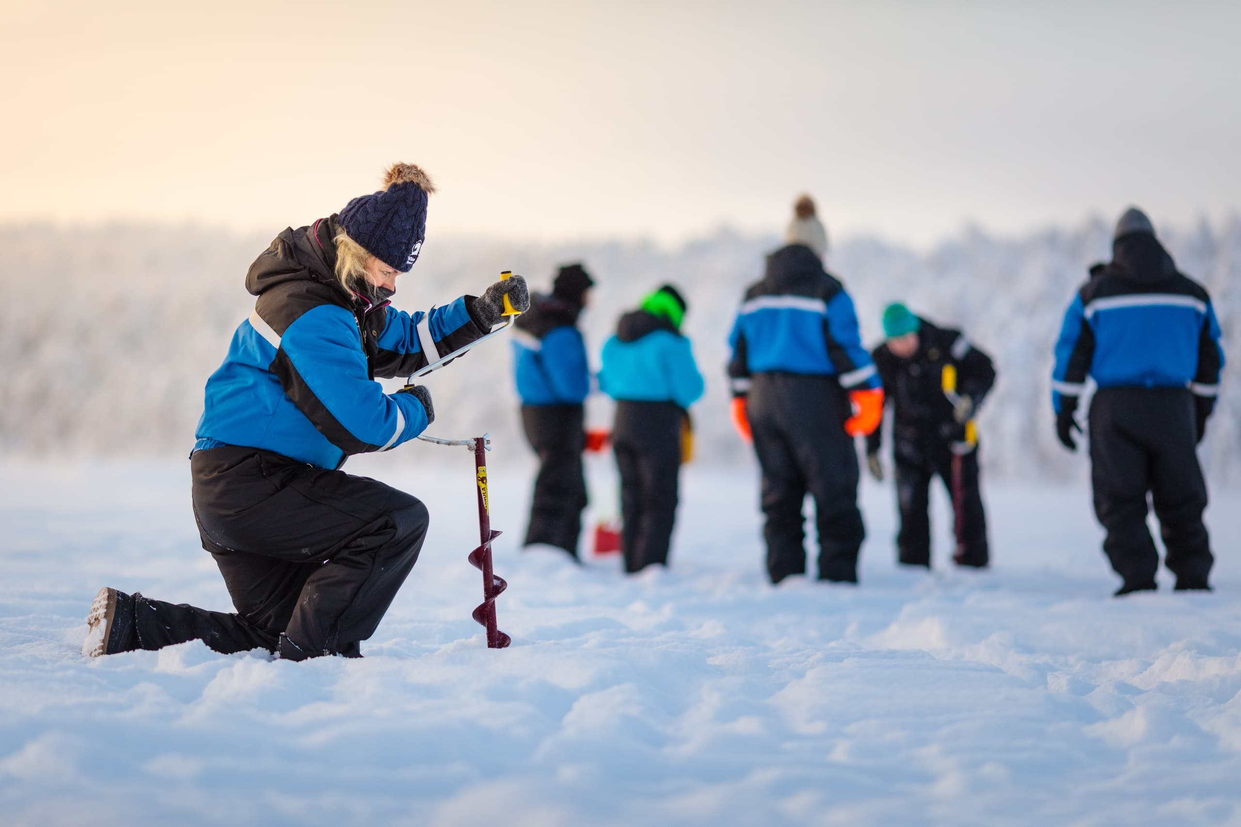 Ice Fishing Trip by Snowmobile Sleigh