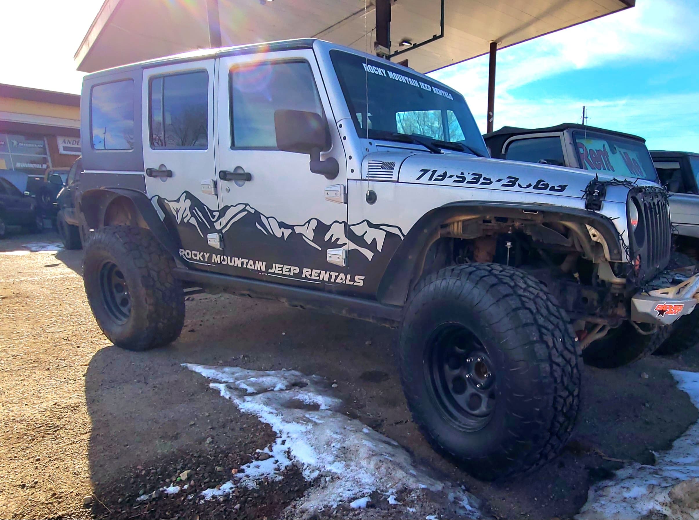 Silver 4 Door Wrangler JKU Modified - CJ""