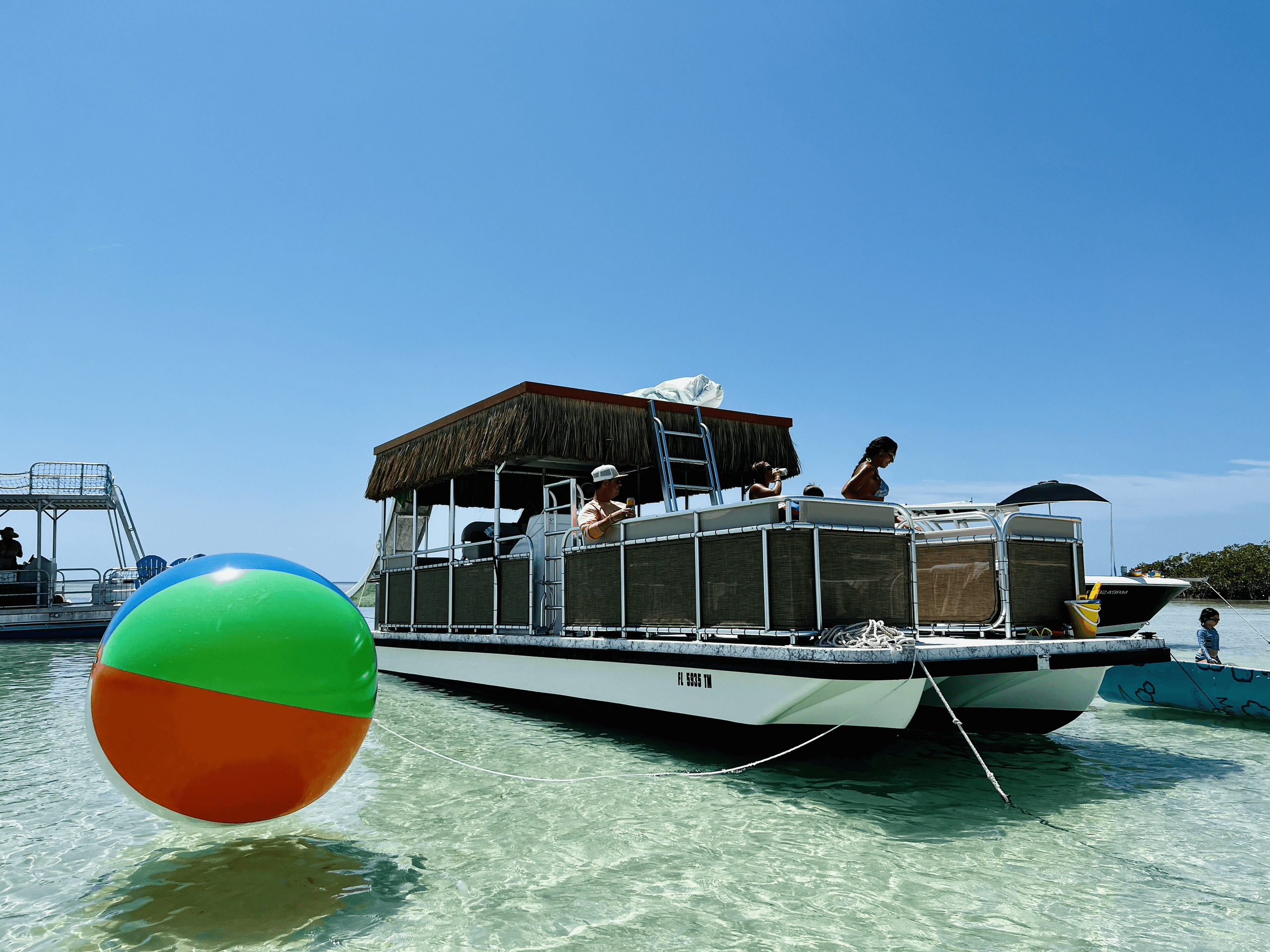 Tiki Boat #2 Rental 7 to 12 people