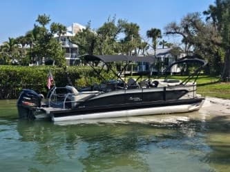 25ft  Barletta Entertainer Tri-toon at Burnt Store Marina