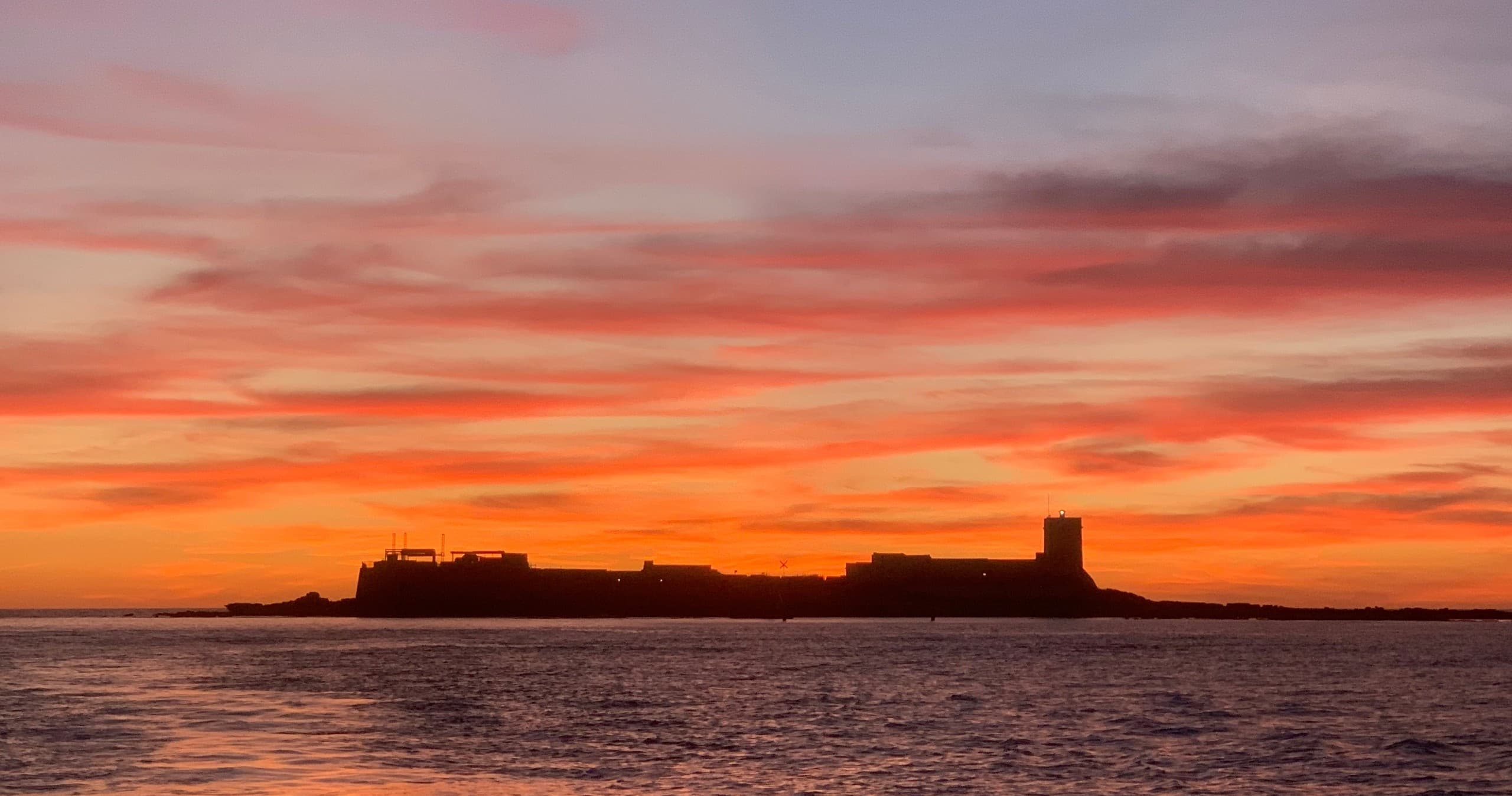 Paseo por la bahía al atardecer