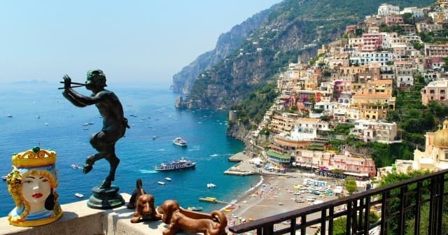 Golden evening in Positano - Shared return transfer by minivan