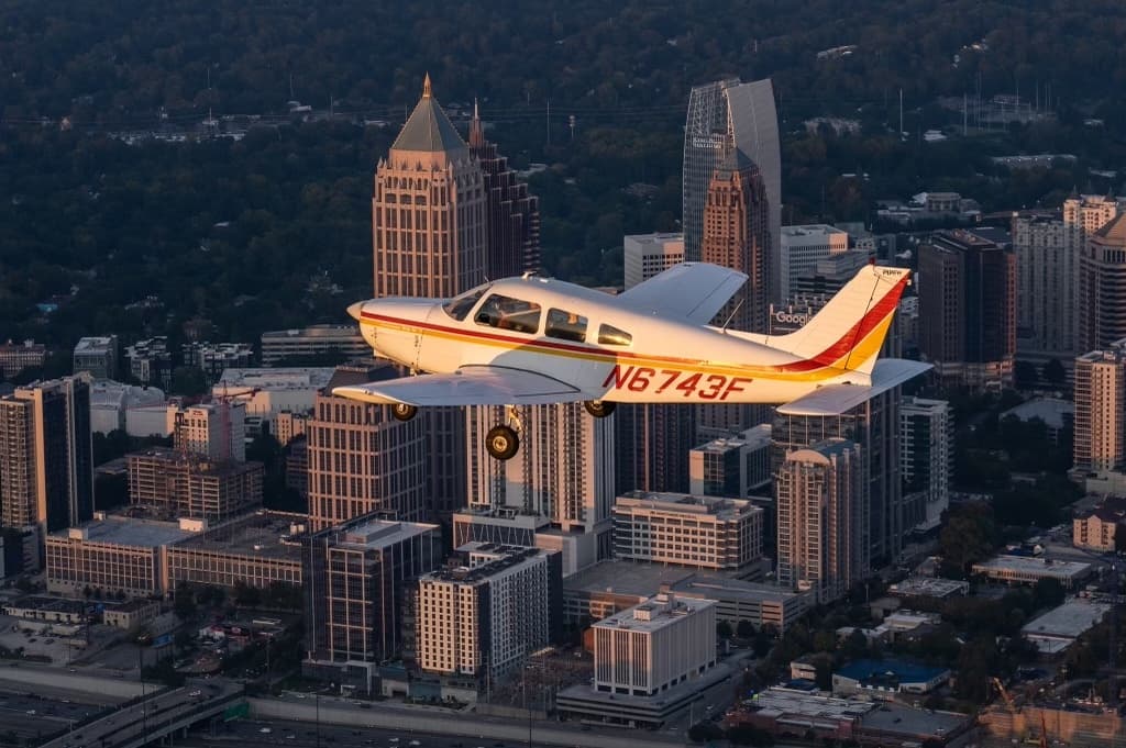 Sunset Stone Mountain + All-Atlanta Skyline in Piper Cherokee