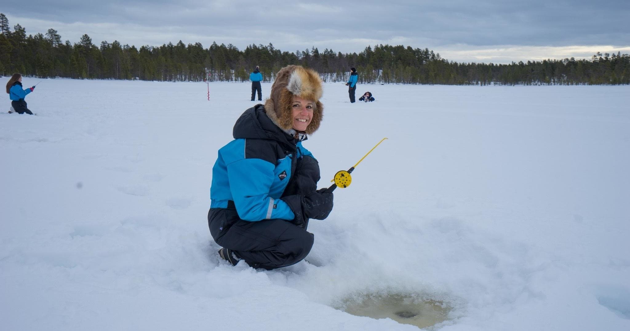 Ice Fishing Trip by Snowmobile Sleigh