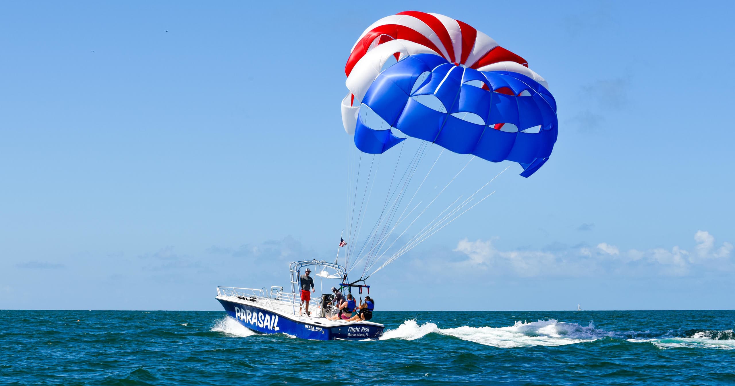 Parasail Adventure - JW Marriott / Hilton / Public Access 239-642-3377
